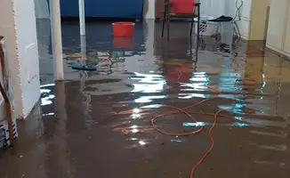 Basement with boiler, cabinets and washing machine completely flooded in Baltimore, MD